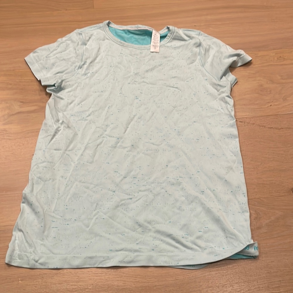 lightweight, new condition Ivivva shirt size 12